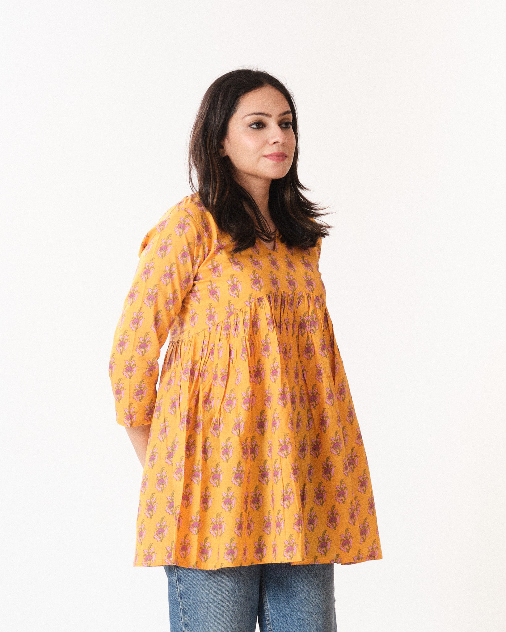 kimaya β short top
