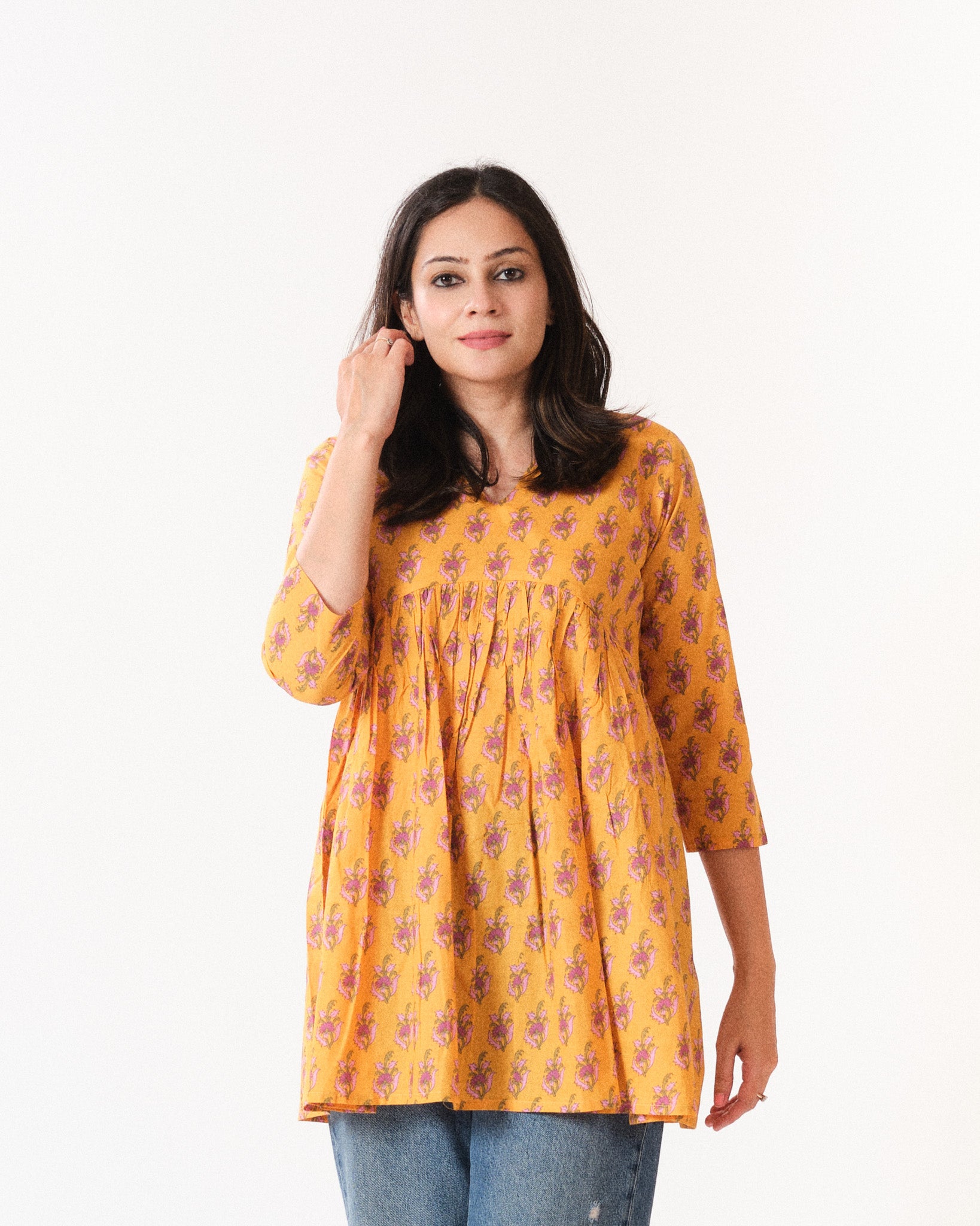kimaya β short top