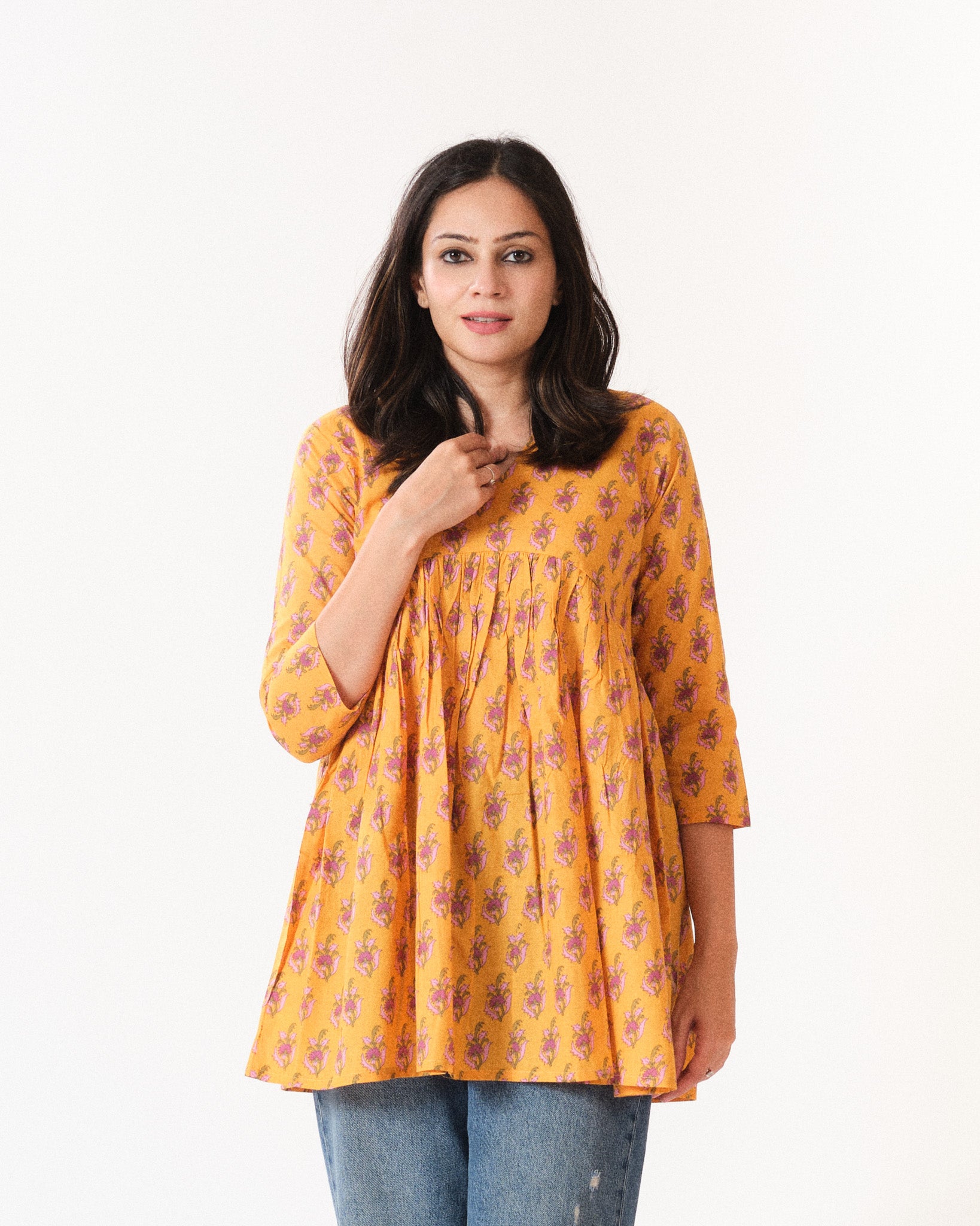 kimaya β short top